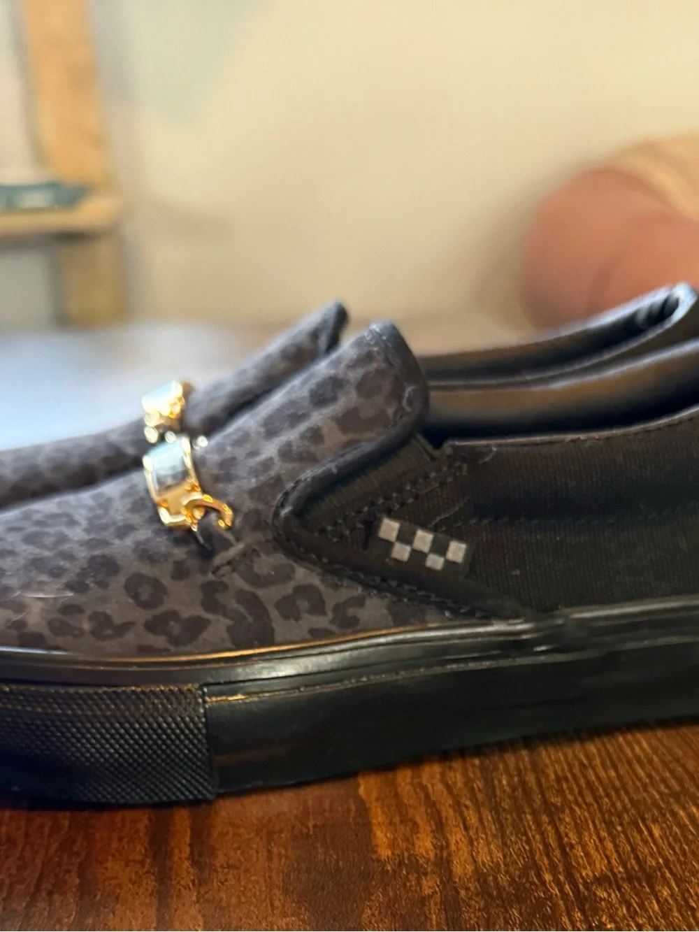 Vans Black Leopard Print Slip-On Loafers with Gold Accent